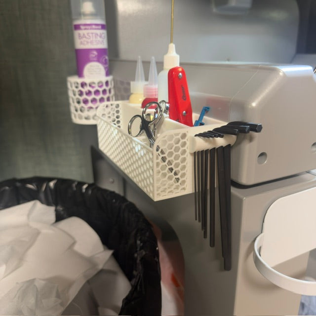 Embroidery tools organized for a Melco