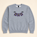 Heather gray BOO Banner embroidered sweatshirt, neatly arranged on a warm ivory studio background