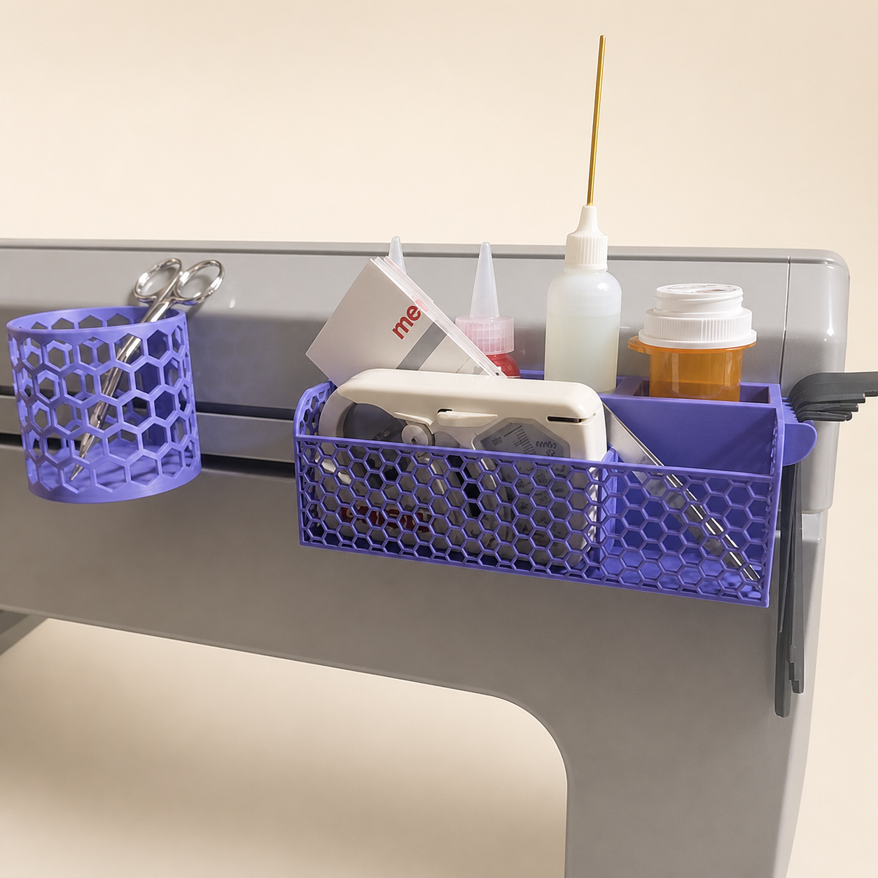 Purple 3D-printed embroidery tool organizer set mounted on a machine stand