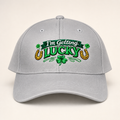Gray I’m Getting Lucky embroidered hat on a warm ivory studio background