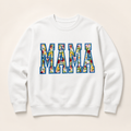 White personalized MAMA appliqué sweatshirt on a warm ivory studio background