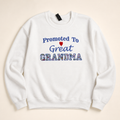 White Promoted to Great-Grandma appliqué sweatshirt on a warm ivory studio background